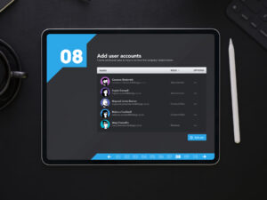 Tablet mockup displaying StrategyBlocks onboarding flow step 8, showing an 'Add user accounts' interface with user avatars, roles, and management options on a dark background.