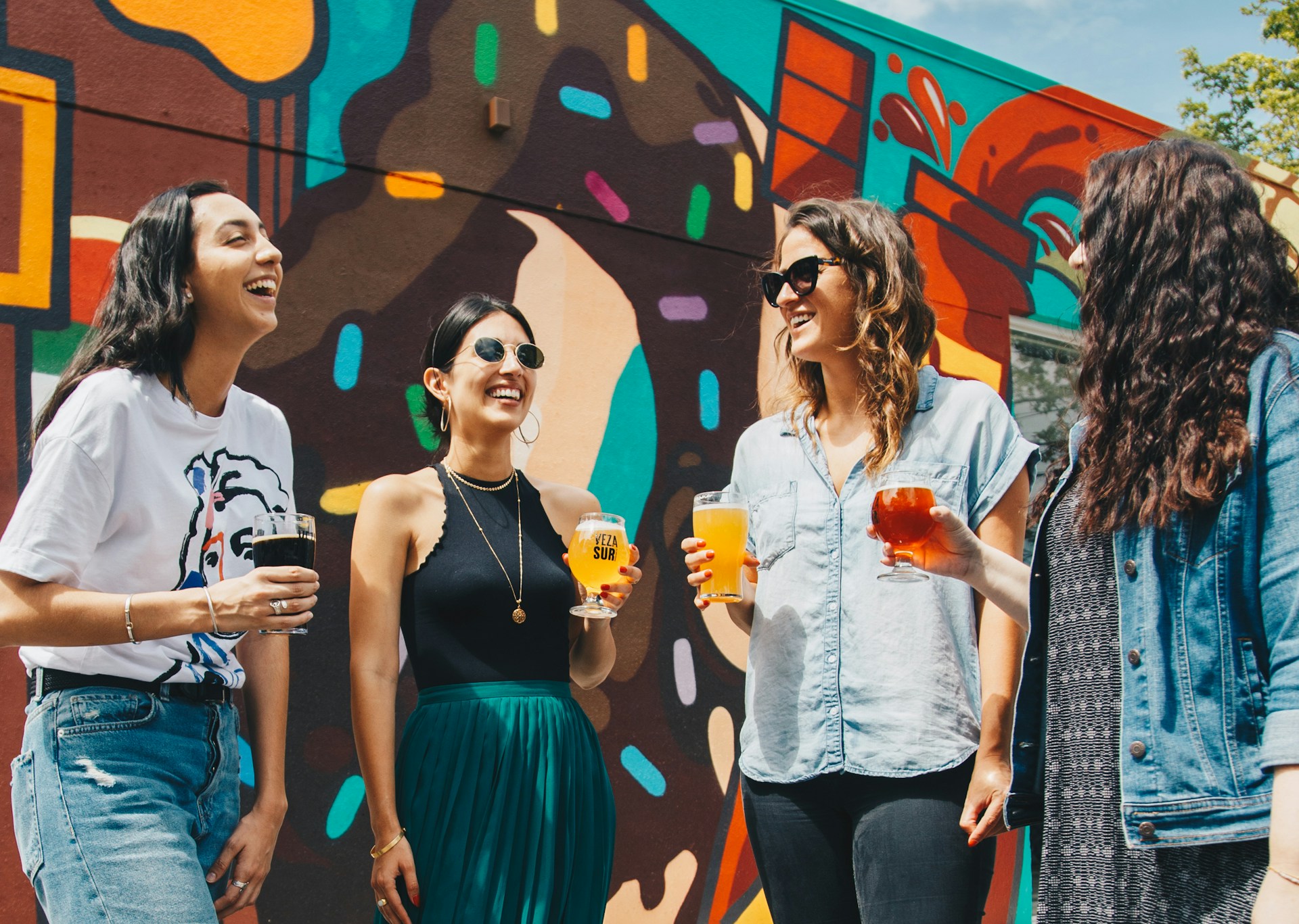 Group of people enjoying a drink at an outdoor bar