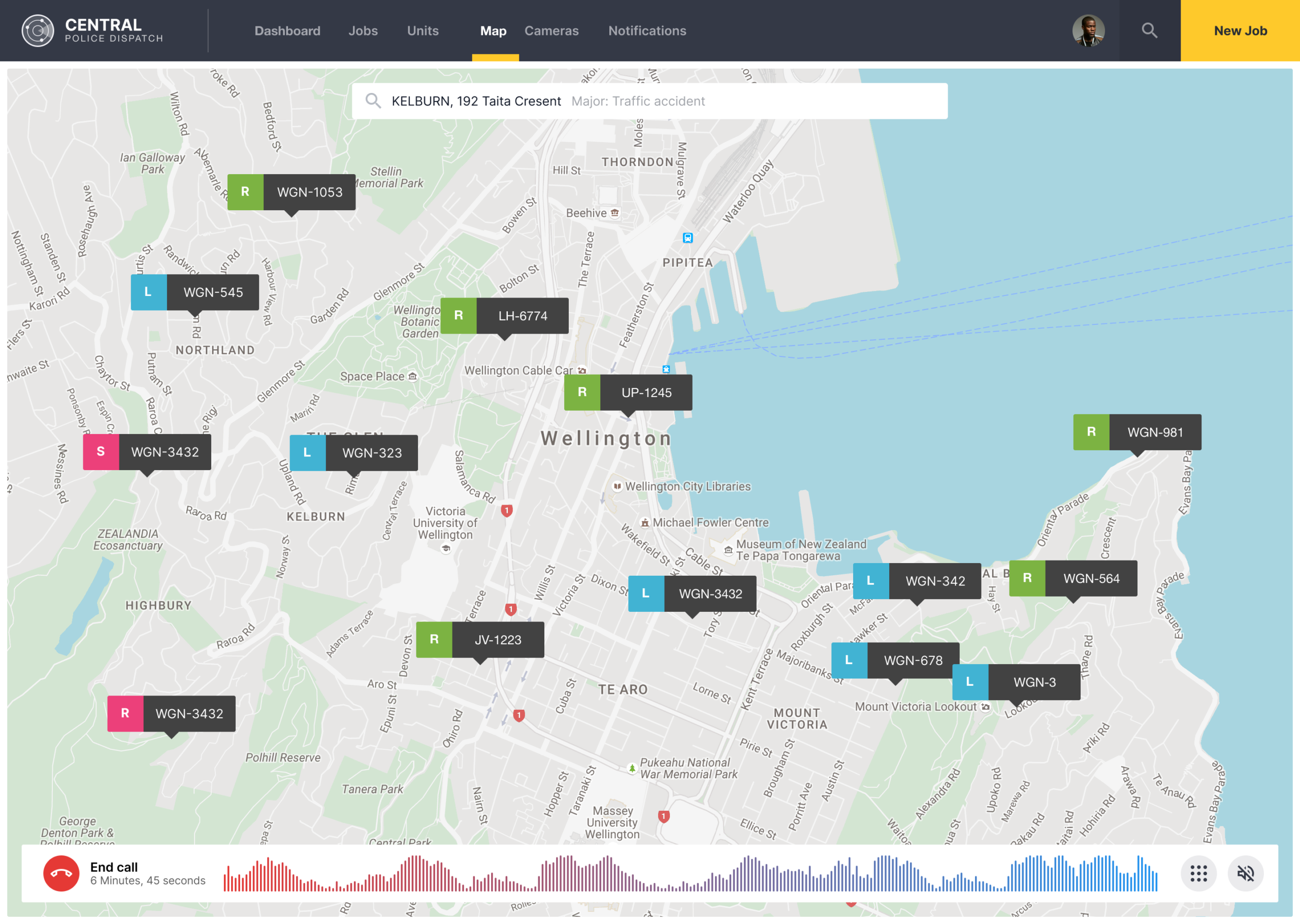 Light mode GIS map tracking unit locations across Wellington while monitoring an active caller audio waveform bar.