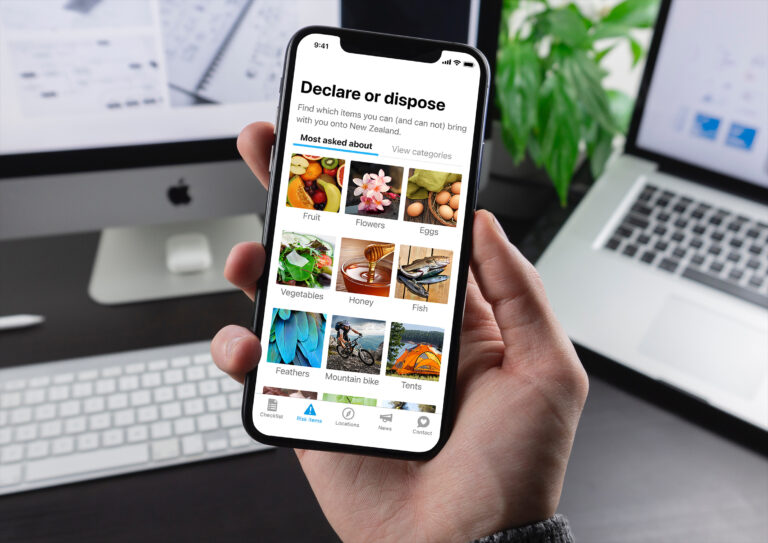 Smartphone mockup displaying the Declare or Dispose menu screen with image categories for biosecurity risk items.