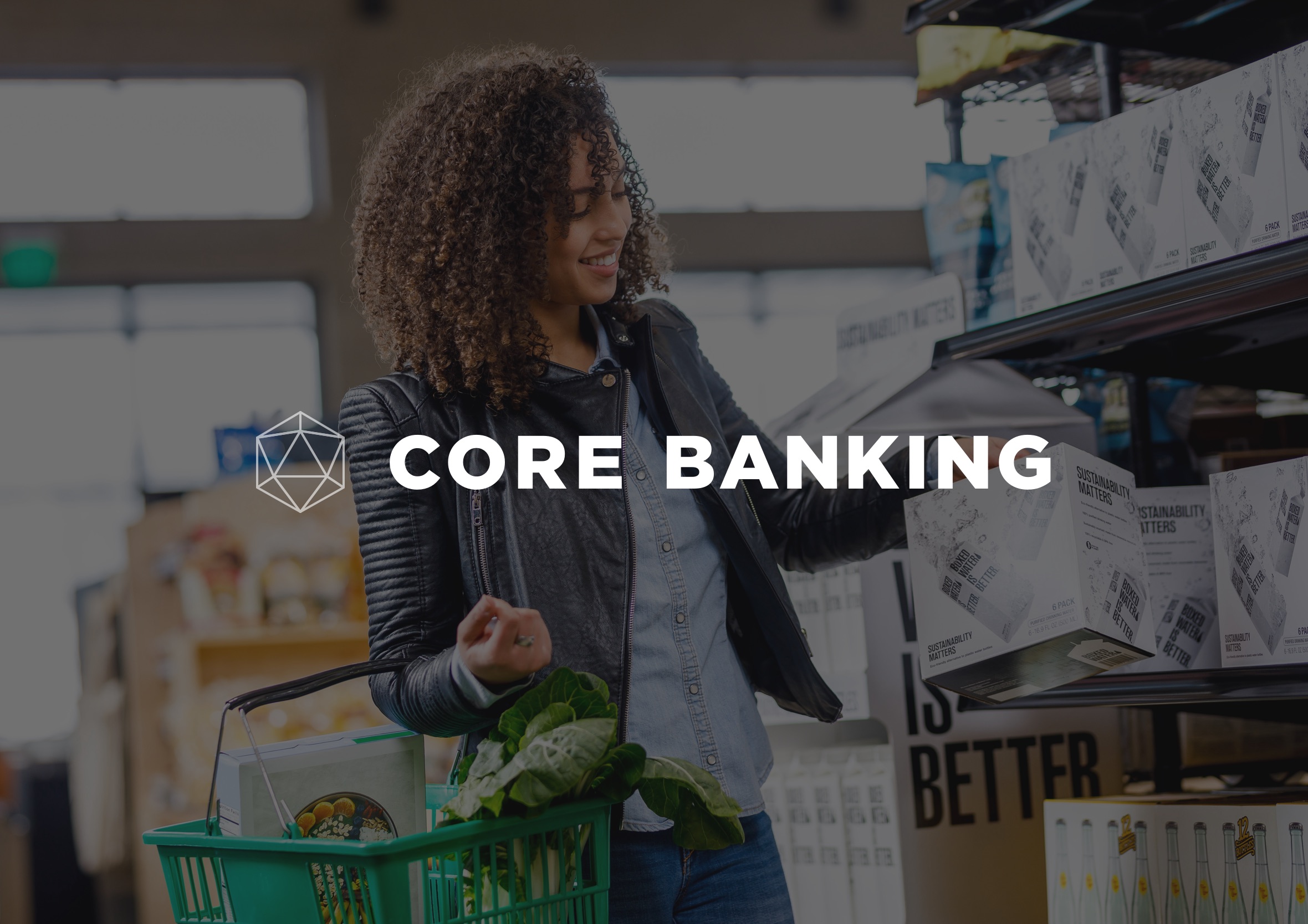 A smiling woman with curly hair holding a green shopping basket while selecting boxed water off a store shelf, overlaid with a geometric logo and bold white 'Core Banking' text.