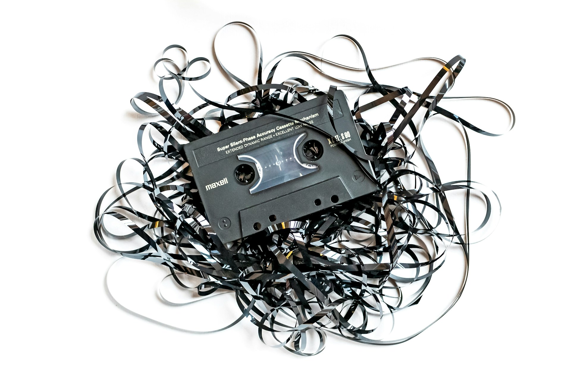 A cassette tape on a plain background representing creativity and personal expression