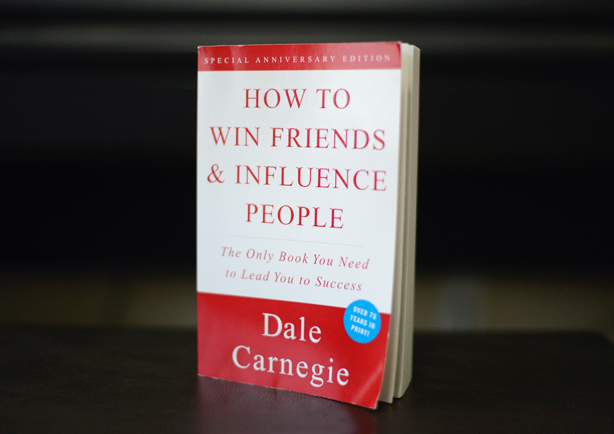 Special anniversary paperback edition cover of How to Win Friends & Influence People by Dale Carnegie.