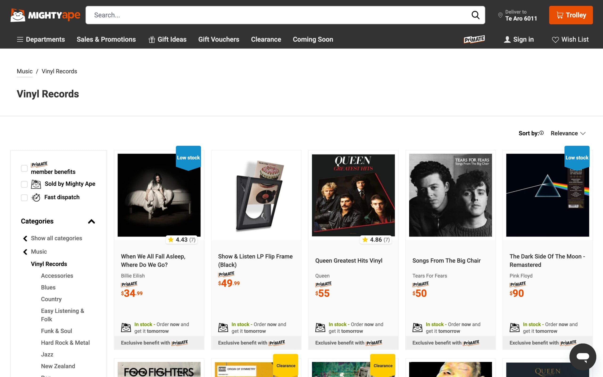 E-commerce catalog layout on Mighty Ape NZ displaying trending vinyl record covers with price tags and stock status badges, streamlining online music shopping.