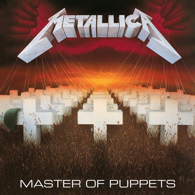 Iconic sleeve art for Metallica's Master of Puppets, featuring a cemetery of white crosses connected to strings in the sky.