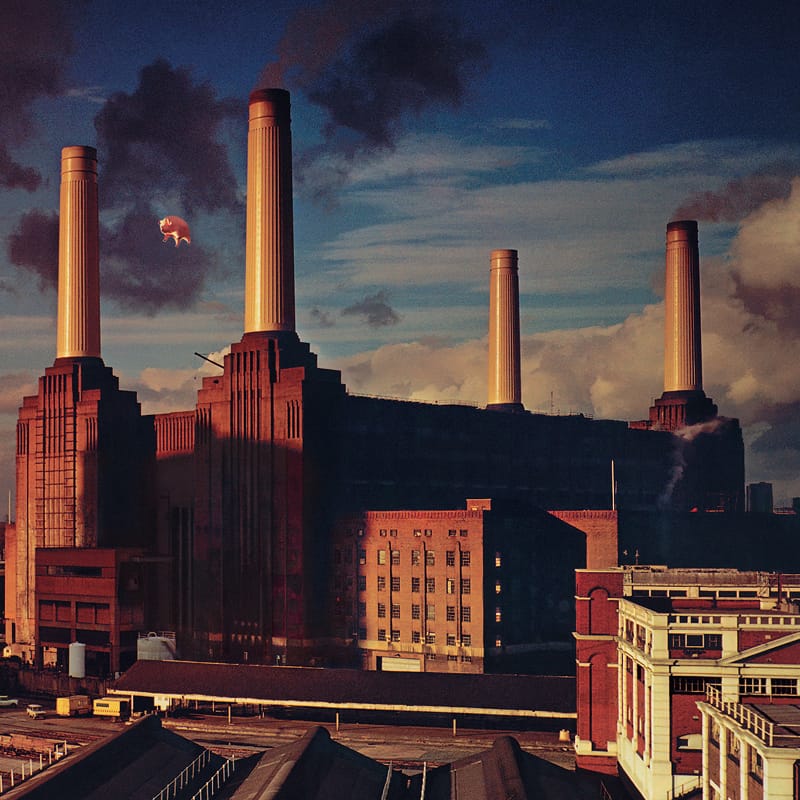 Photographic sleeve for Pink Floyd's Animals, showing an inflatable pig floating above Battersea Power Station.