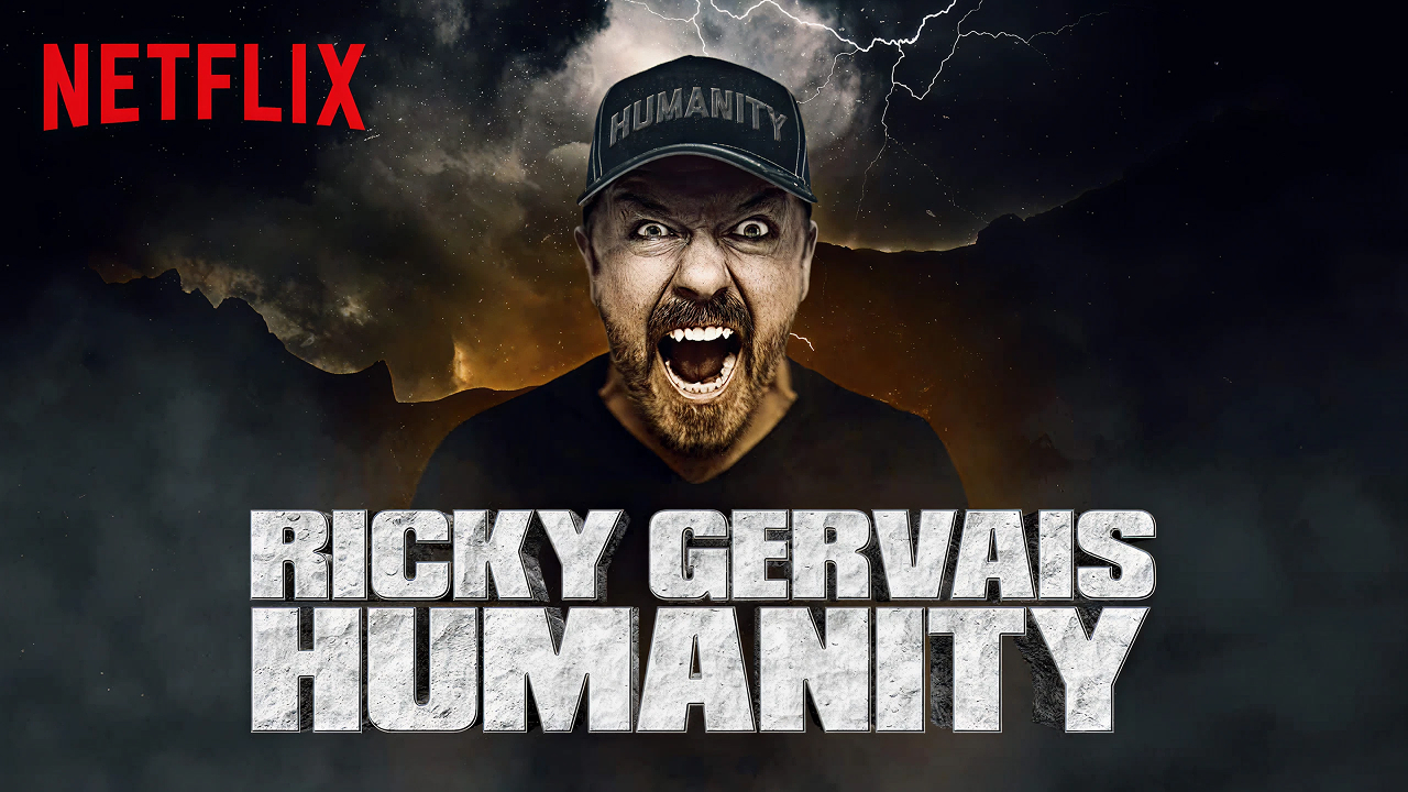 Promo shot for Ricky Gervais' stand-up comedy special Humanity showing Gervais wearing a dark shirt and hat.