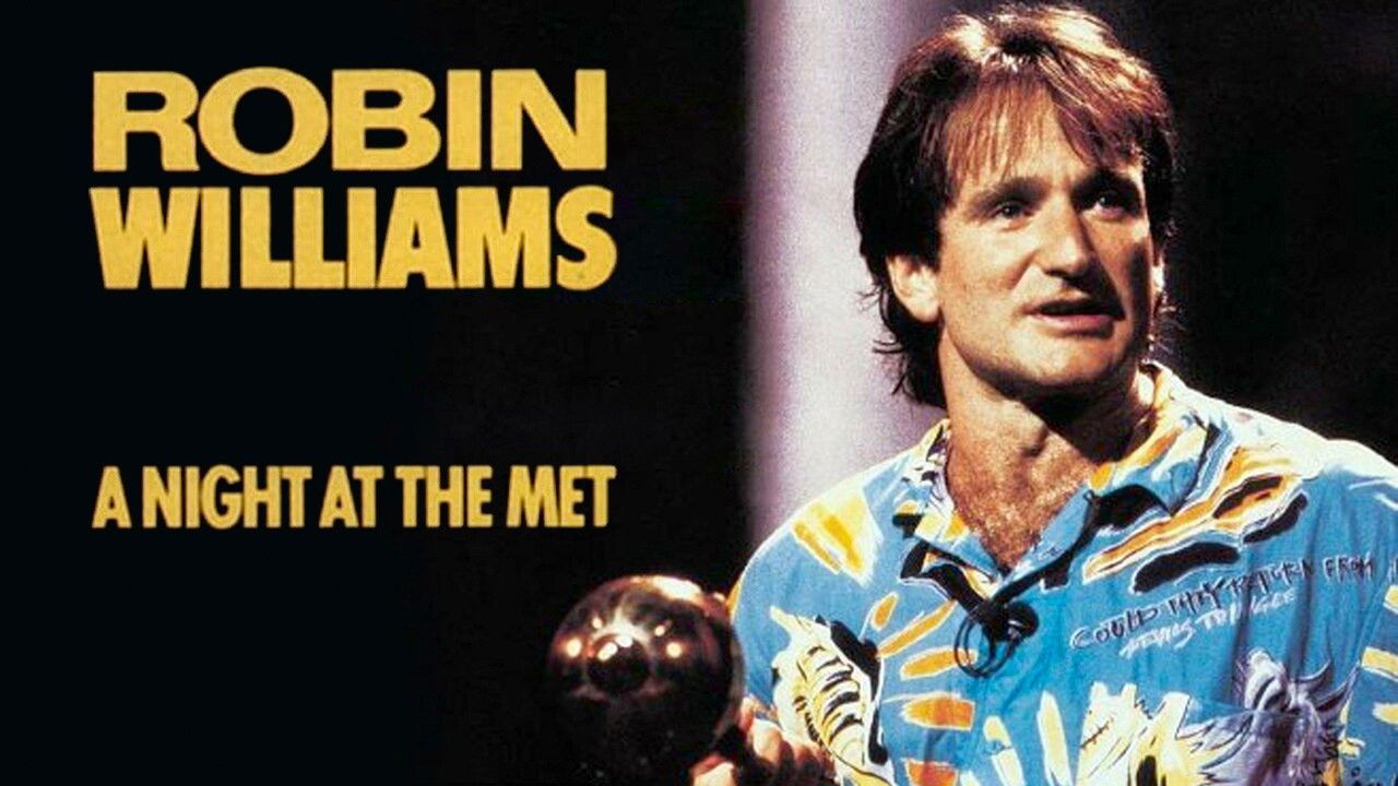 Title card for Robin Williams' stand-up comedy special An Evening at the Met showing Williams smiling in a patterned Hawaiian shirt.