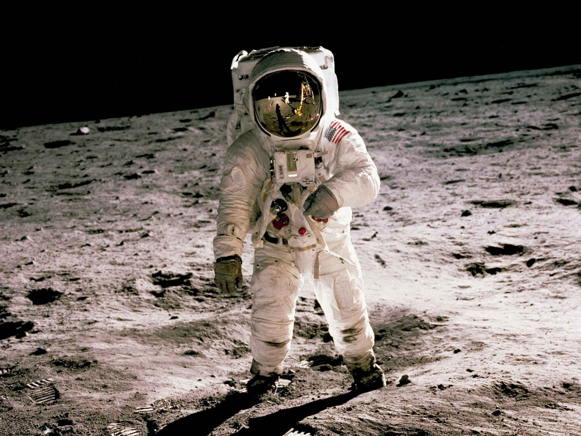 Buzz Aldrin standing on the lunar surface during the Apollo 11 moon landing.