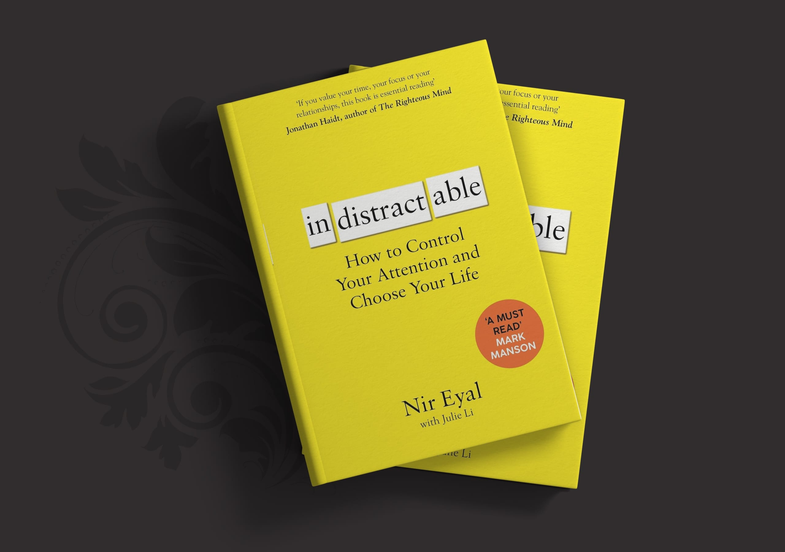 Yellow cover of Indistractable by Nir Eyal with Julie Li